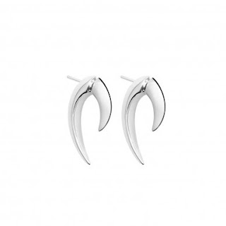 Shane Leane leads the way in modern fine jewellery. Make any office outfit effortlessly cool with these silver talon earrings. They are elegant and edgy and a great alternative for someone who does not want to wear hoop earrings.