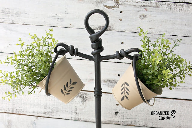 Garage Sale Hand Towel Stand Repurposed As A Plant Stand #repurpose #upcycle #garagesalefinds #metalpail #stencil