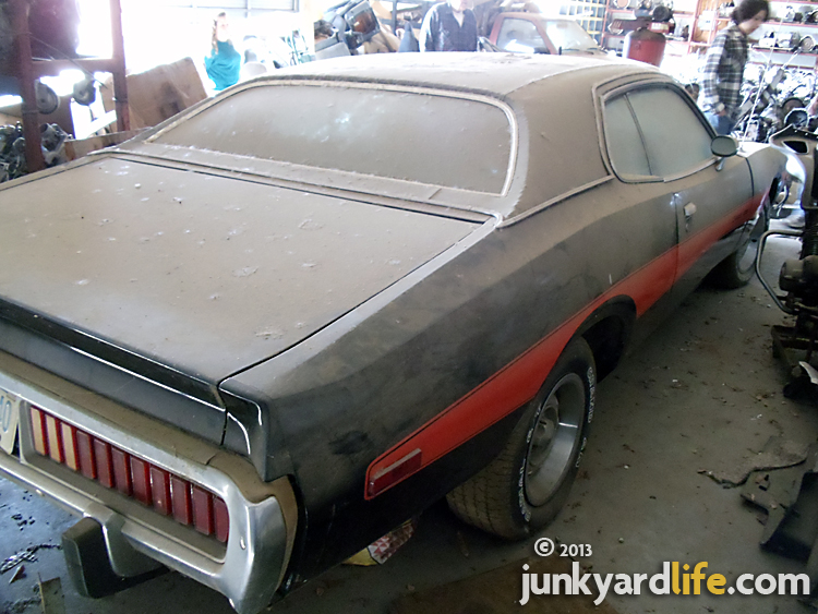 Black 1973 Dodge Charger 440 Magnum Rallye parked for 20 years in storage building at Stinnett's Auto Parts in Alabama on junkyardlife.com