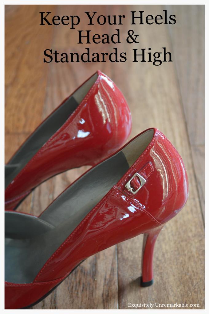 Keep Your Heels Head & Standard High text on photo of Red heels on wood floor