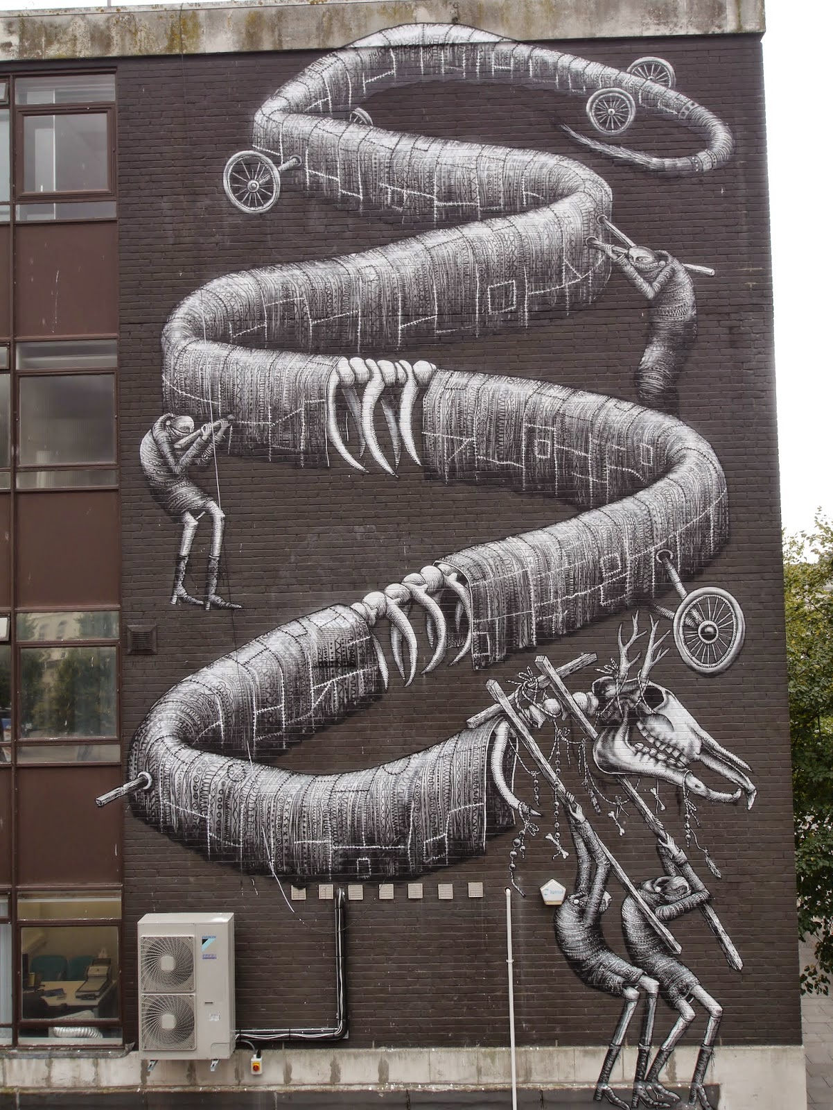 Phlegm is currently in South Wales where he just wrapped up this massive mural somewhere on the streets of Cardiff.