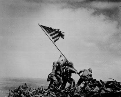 Placing the flag at Iwo Jima, 1945. Joe Rosenthal, AP