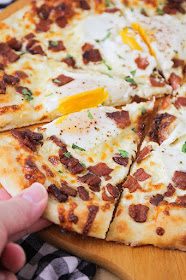 This bacon breakfast pizza is perfect for any meal of the day! It's so flavorful and delicious, and easy to make too!