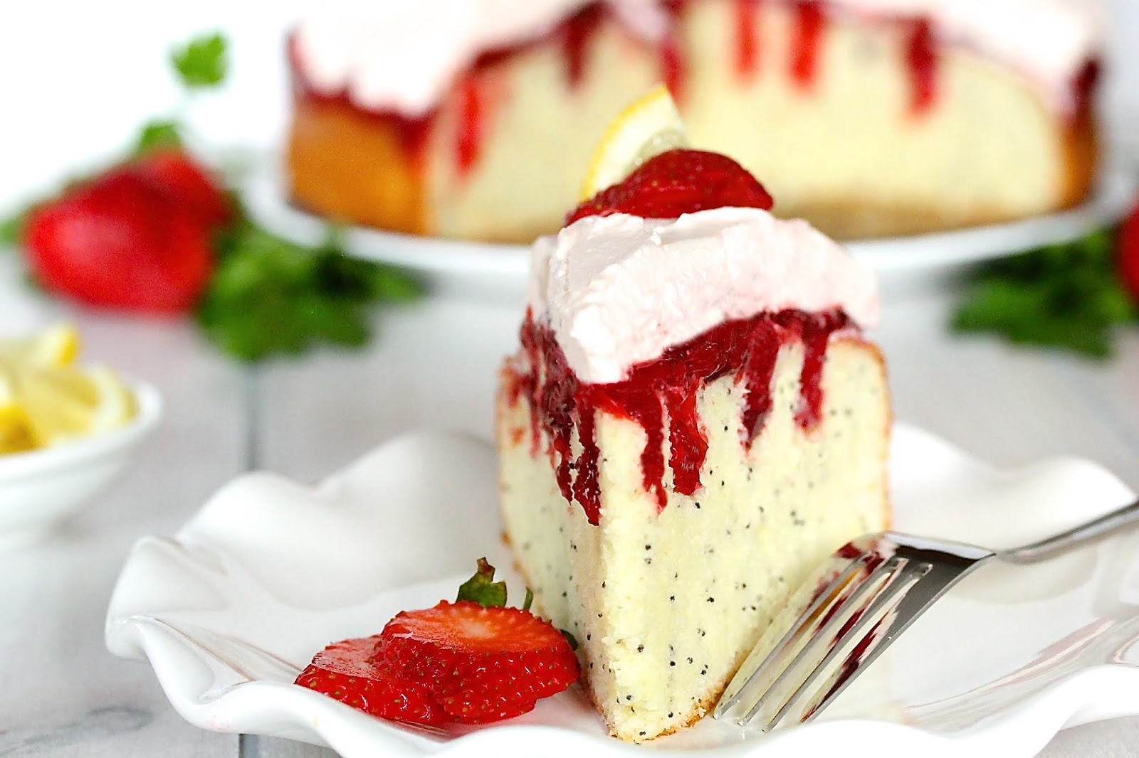 POPPY SEED STRAWBERRY POKE CAKE WITH PINK LEMONADE WHIPPED CREAM