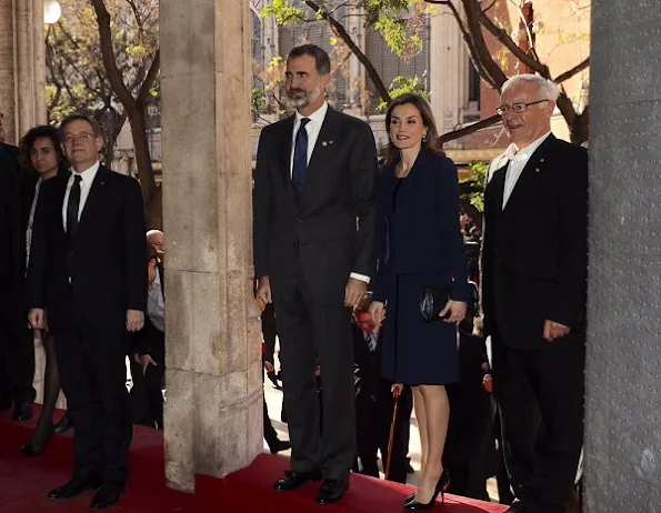 Queen Letizia wore Felipe Varela dress and coat, Felipe Varela clutch bag, Magrit Black Leather pumps, Bvlgari Aquamarine and Sapphire Gold Earrings