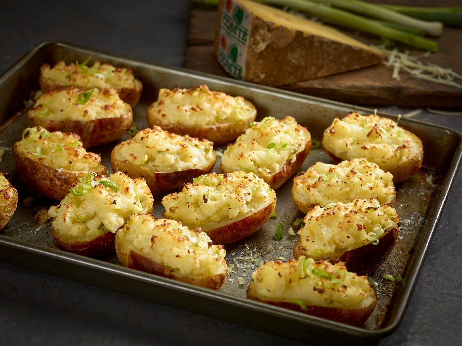 Twice Baked Potatoes With Comté And Spring Onions