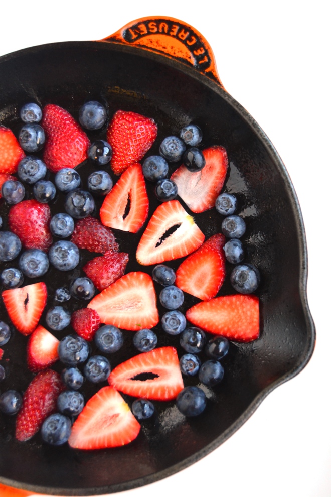 Strawberry Blueberry Dutch Baby makes the perfect breakfast or brunch dish! Made healthier with whole-wheat flour and loaded with fresh berries and ready in less than a half-hour. www.nutritionistreviews.com