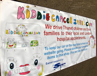 Photograph of KiddieCancerInfo.com printed banner.