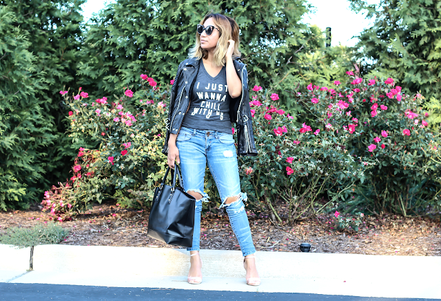 Ripped jeans and black moto Jacket