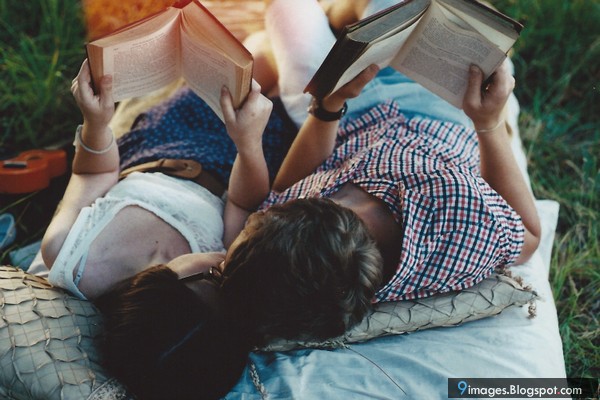 Kissing Cute Couple Reading Book