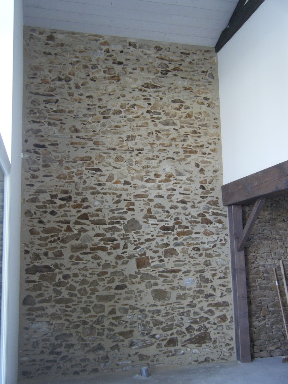 La grange de la Boisselière Enduit à la chaux sur les