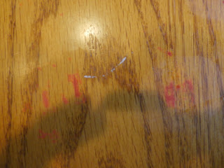 Paint marks on kitchen table