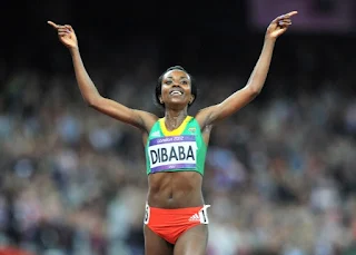 Tirunesh Dibaba, Ethiopian long distance track athlete has three gold medals and is the current World and Olympic 10,000 meters champion.