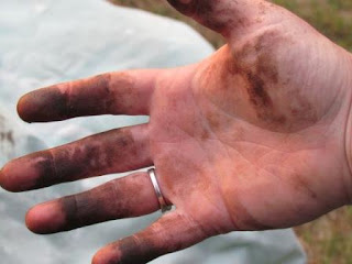 hand covered in stain