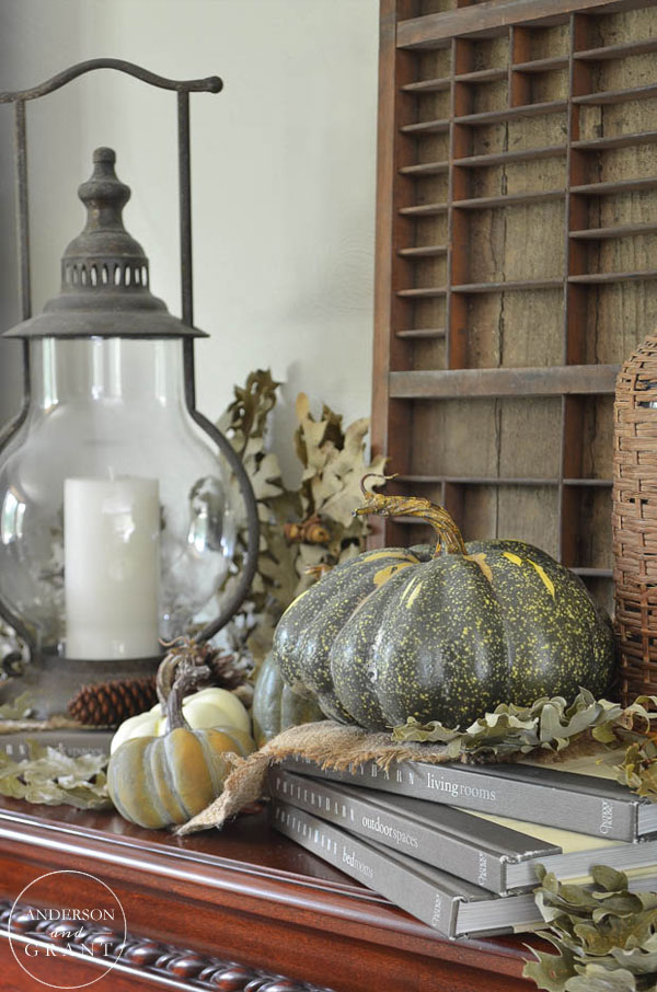 Use books to create different levels in your fall display.  |  www.andersonandgrant.com
