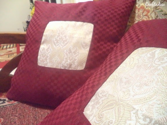 Envelope Cushion cover with centered Golden Patch
