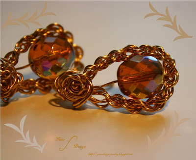 Handmade wire earrings with glass bead made by Gunadesign