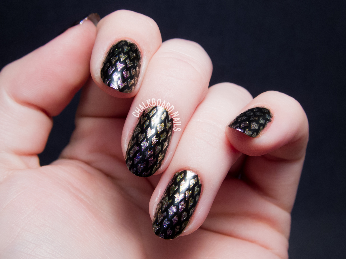 Freehand dragon scale nail art by @chalkboardnails