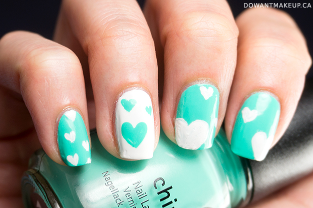Valentine's Day nail art teal white hearts