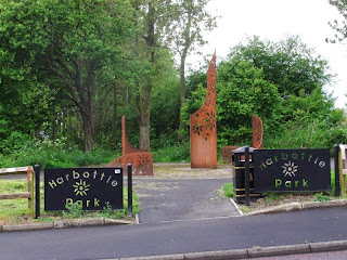 The south eastern entrance to Harbottle Park