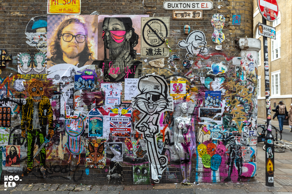 Brick Lane Street Art Paste-Ups on Buxton Street, London Brick Lane Street Art Paste-Ups on Buxton Street, London