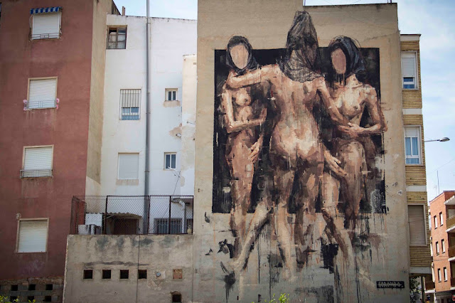 Street Art By Spanish Street Artist Borondo On the Streets Of Blanca in Spain. 1