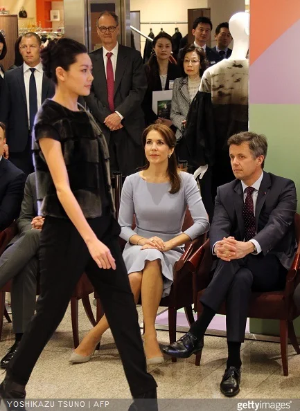 Crown Prince Frederik and Crown Princess Mary watch a seal skin fashion show by Danish designer Jesper Hovring at a department store in Tokyo