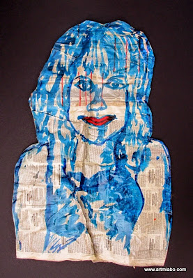 portrait on crumbled old newspaper
