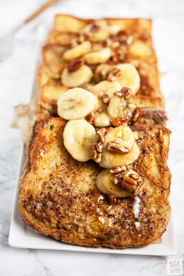 Bananas Foster French Toast on a white tray ready to serve