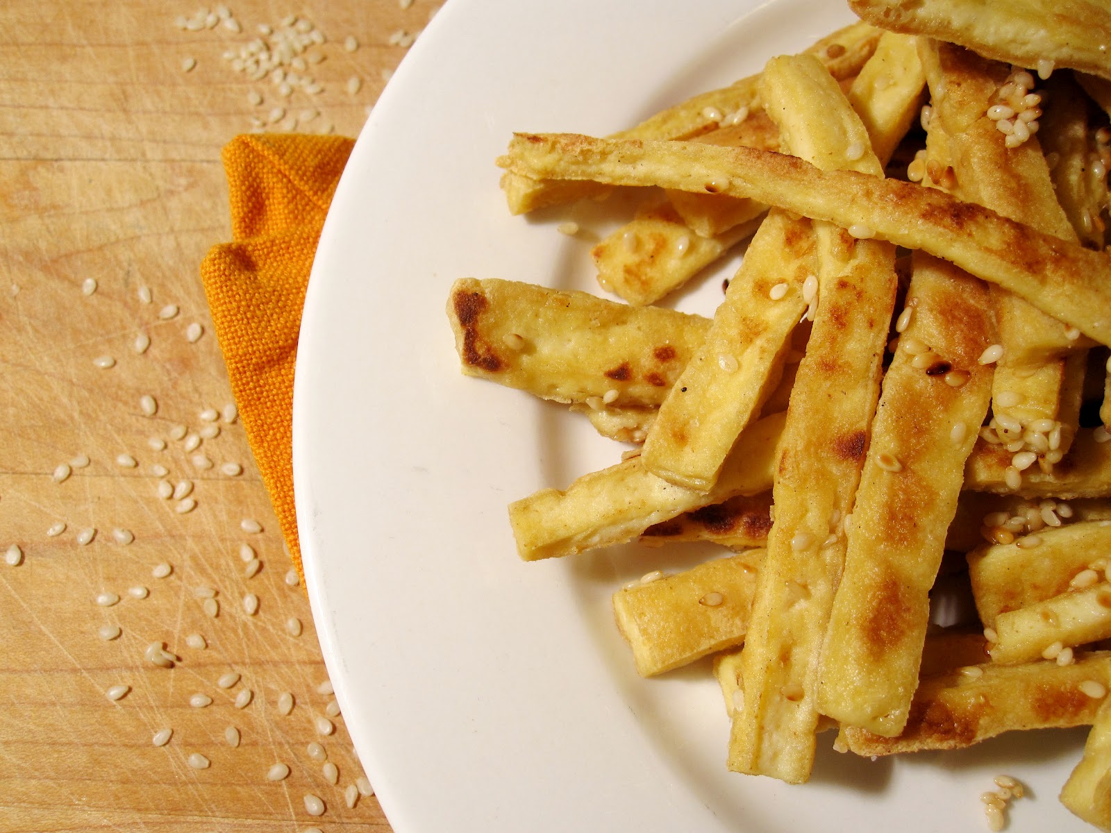 Edible biology Snow pea, mango and golden tofu salad with peanutlime