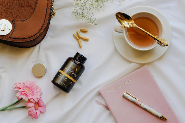 brown bag with tea and focus supplements