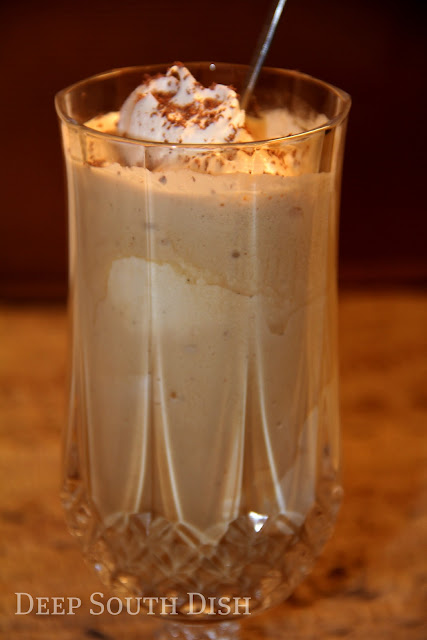 Scoops of vanilla ice cream, topped with chocolate syrup and a coffee punch, made with Godiva chocolate truffle coffee blended with more ice cream and homemade whipped cream, makes for a decadent and refreshing coffee punch float.
