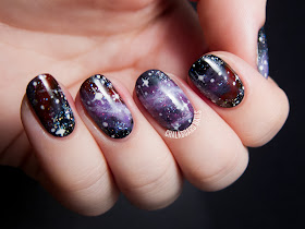 Galaxy nail art by @chalkboardnails