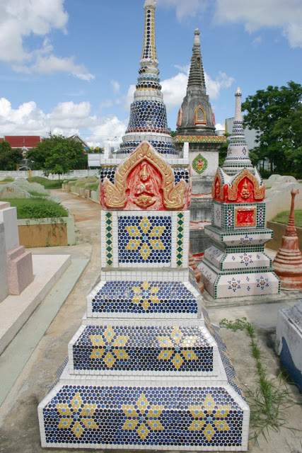 Complex tile design and painting to decorate  the Stupa gravestones of Thai people.