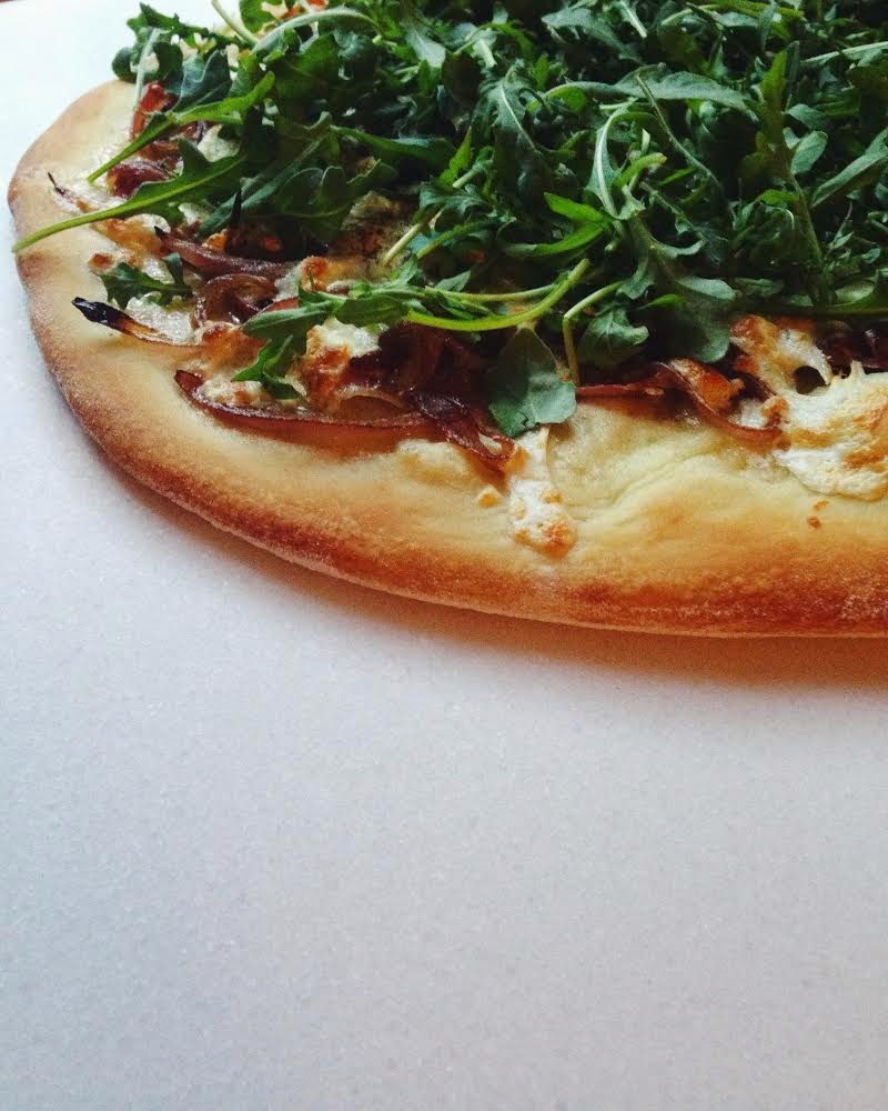 Something Ivory Homemade Pizza with Prosciutto, Arugula, and