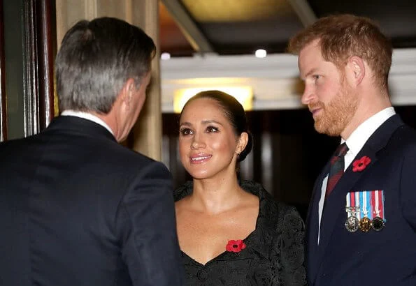 Meghan Markle is wearing Jessica McCormack Gypset Ruby hoop earrings. Queen Elizabeth, Kate Middleton, Prince William, Prince Harry
