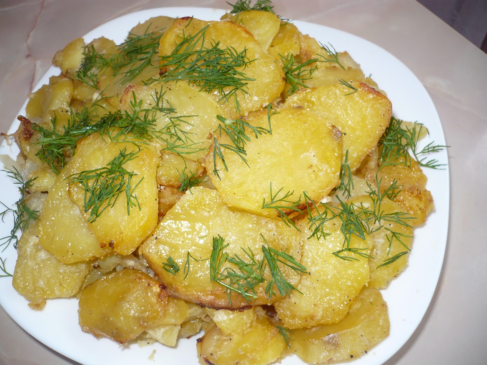 Cand Se Da Cu Stomp La Cartofi retete culinare - simple si delicioase: Cartofi cu smantana la cuptor