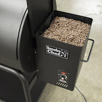 Auger-fed hardwood pellet delivery system