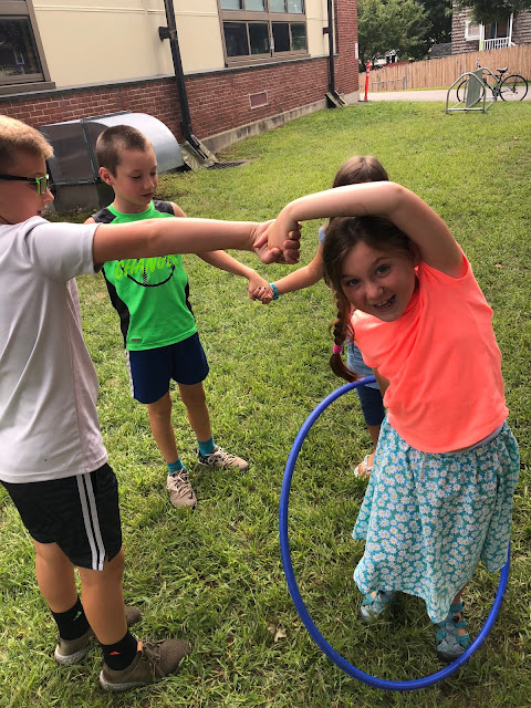 teamwork with hula hoops