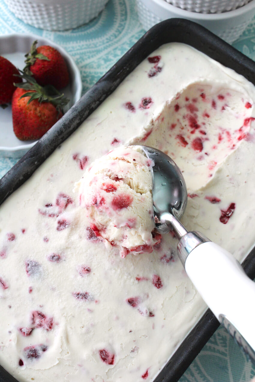 No Churn Strawberry Vanilla Ice Cream is a creamy homemade treat that you will want to make again and again.  No ice cream maker required! #icecream #dessert