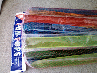 Popsicles in a plastic net bag