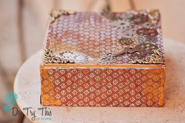 Altered cigar box with embellishments