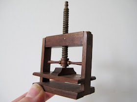 One-twelfth scale wooden book press.