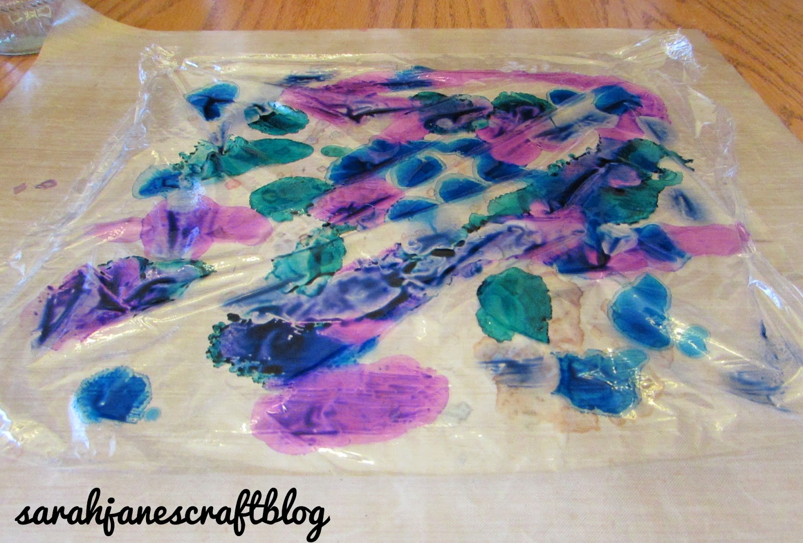 Alcohol Ink and Plastic Wrap on a Glass Bottle