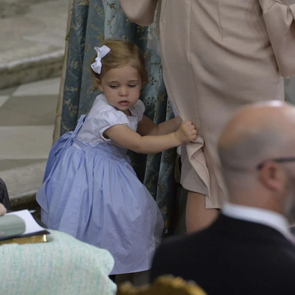 Queen Silvia and King Carl Gustaf of Sweden, Crown Princess Victoria, Prince Daniel, Princess Estelle, Princess Madeleine of Sweden with daughter Princess Leonore and Christopher O'Neill, Prince Carl Philip and Princess Sofia, Prince Haakon and Princess Mette-Marit of Norway, Crown princess Mary and Prince Frederik of Denmark, Ewa and Olle Westling at the christening of Prince Oscar of Sweden at the Royal Chapel in Stockholm.Antonio Berardi Blue Cape-back Stretch Crepe Dress