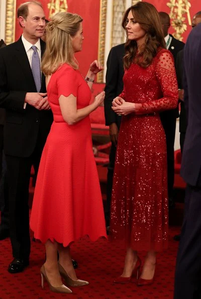 Kate Middleton wore a new red sequined tulle gown by Needle and Thread. The Countess of Wessex wore a stripe knit dress by Alaïa