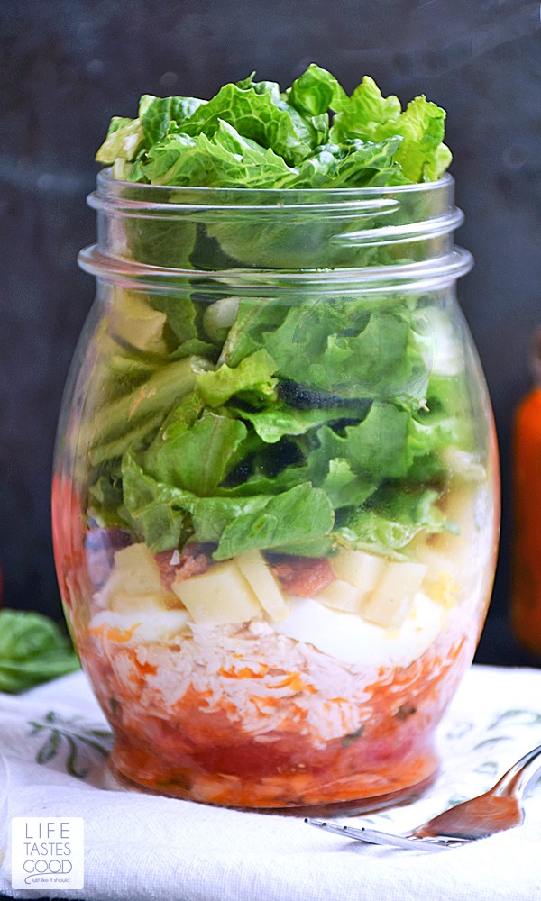 Cobb Salad in a Jar | by Life Tastes Good is a convenient way to take a fresh meal with you anywhere you go! Work, school, picnics, road trips, you name it! This salad likes to travel! Just add a fork <smile>. It's also the perfect make-ahead meal to have on hand for those busy days when you are just too tired to cook.