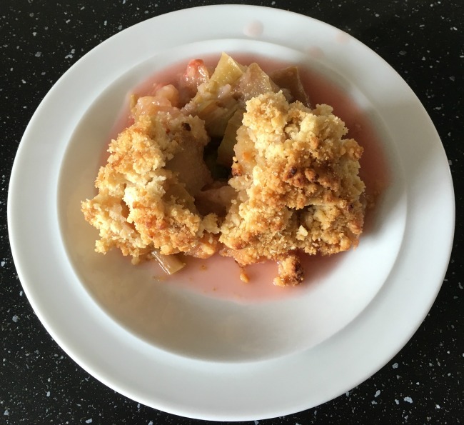 Traditional-Rhubarb-crumble-portion-on-white-plate