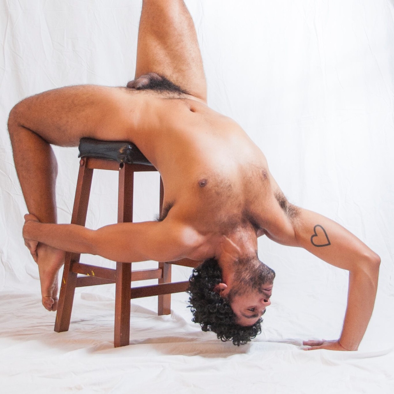 Gay men naked yoga photostures.