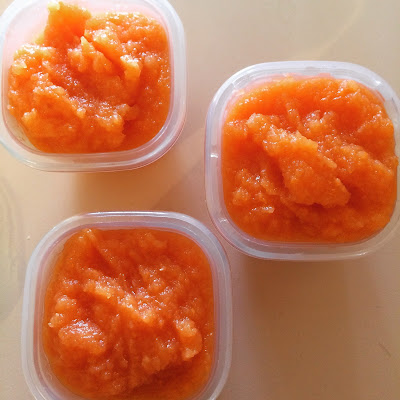 Carrot applesauce in baby food containers.